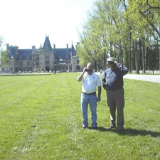 Rummy and Alex at Rummy's summer cottage. (That's the Biltmore house in Ashville, NC.)